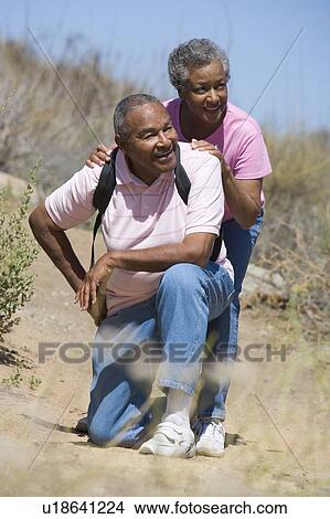 Picture - Senior couple on a walking trail. Fotosearch