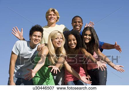 Six people outdoors having fun together View Large Photo Image Stock Photo - Six people outdoors having fun together. Fotosearch