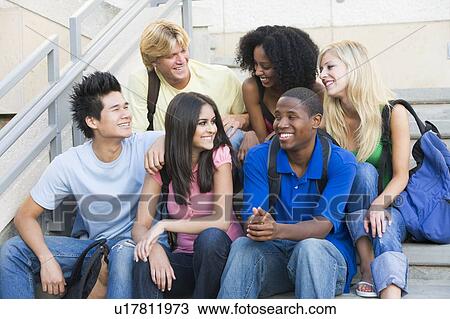 Six people sitting on staircase outdoors smiling View Large Photo Image Stock Image - Six people sitting on staircase outdoors smiling. Fotosearch