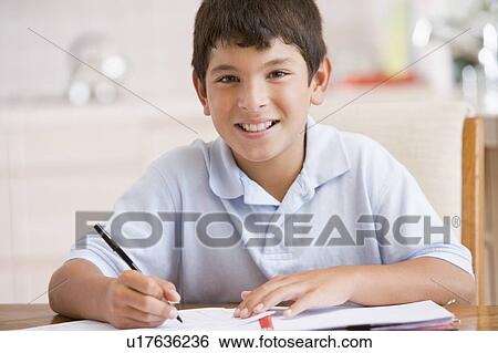 Boy Doing His Homework View Large Photo Image Stock Photograph - Boy Doing His Homework. Fotosearch