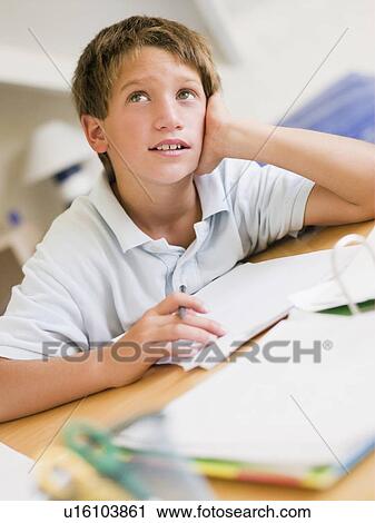 Young Boy Doing Homework In His Room View Large Photo Image Stock Image - Young Boy Doing Homework In His Room. Fotosearch