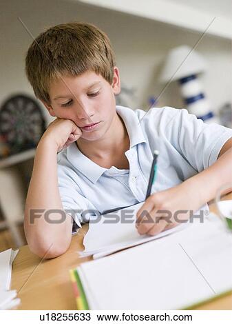 Young Boy Doing Homework In His Room View Large Photo Image Stock Image - Young Boy Doing Homework In His Room. Fotosearch