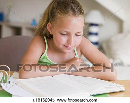 Young Girl Doing Her Homework View Large Photo Image Stock Photography - Young Girl Doing Her Homework. Fotosearch
