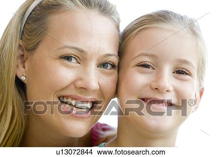 Picture - Woman and young girl smiling. Fotosearch