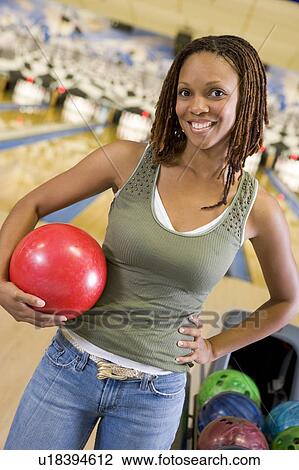 Woman at a bowling lane View Large Photo Image Stock Image - Woman at a bowling lane. Fotosearch