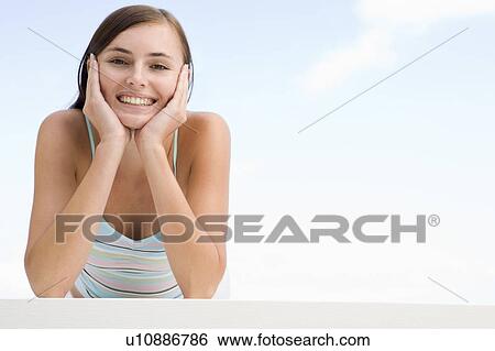 Woman posing outdoors View Large Photo Image Stock Photograph - Woman posing outdoors. Fotosearch