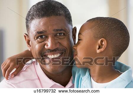 Grandfather and grandson hugging. View Large Photo Image Stock Image - Grandfather and grandson hugging.. Fotosearch