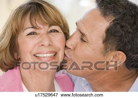 Two couples indoors smiling View Large Photo Image Stock Photo - Two couples indoors smiling. Fotosearch