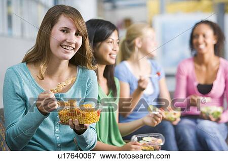 Stock Photo - Students having lunch. Fotosearch