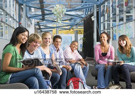 Stock Photo - Students study group with teacher. Fotosearch