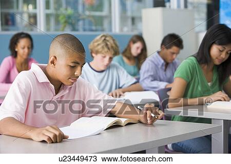 Students studying in geography class View Large Photo Image Stock Image - Students studying in geography class. Fotosearch