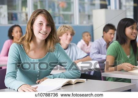 Stock Photograph - Students studying in geography class. Fotosearch