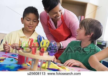 Teacher and students in art class (selective focus) View Large Photo Image Stock Image - Teacher and students in art class (selective focus). Fotosearch