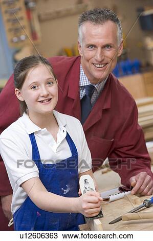 Female student learning woodworking View Large Photo Image Stock Image - Female student learning woodworking. Fotosearch