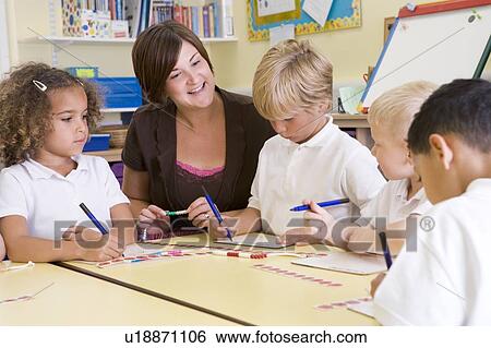 Students and teacher in math class with counting beads View Large Photo Image Stock Photograph - Students and teacher in math class with counting beads. Fotosearch
