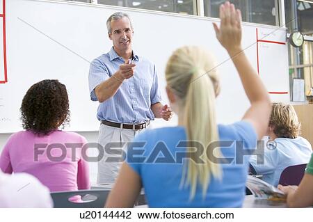 Students answering questions in math class with teacher View Large Photo Image Stock Image - Students answering questions in math class with teacher. Fotosearch