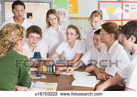 Students receiving chemistry lesson in classroom View Large Photo Image Stock Image - Students receiving chemistry lesson in classroom. Fotosearch