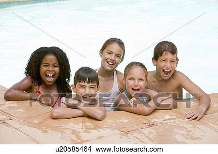 Picture - Five young friends in swimming pool smiling. Fotosearch