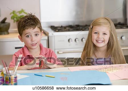 Two Young Friends Drawing Pictures View Large Photo Image Stock Photo - Two Young Friends Drawing Pictures. Fotosearch