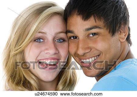 Close-Up Portrait Of Teenage Couple, View Large Photo Image Stock Image - Close-Up Portrait Of Teenage Couple, . Fotosearch