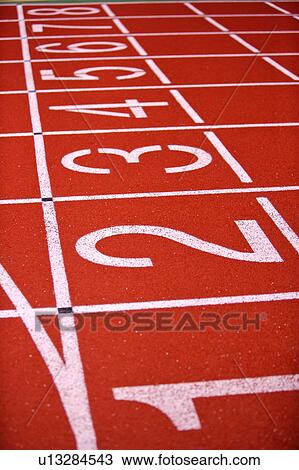 Close-up of numbers on the running track View Large Photo Image Stock Image - Close-up of numbers on the running track. Fotosearch