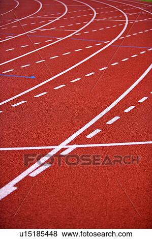 Stock Photo - Close-up of red running track. Fotosearch
