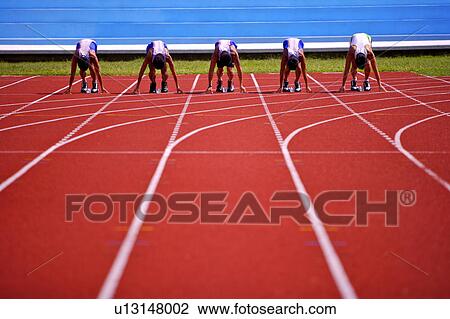 Five male athletes on track starting block View Large Photo Image Stock Image - Five male athletes on track starting block. Fotosearch