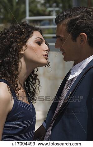 Stock Photo - Business couple in a park. Fotosearch
