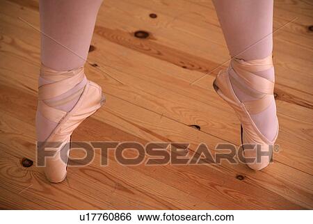 Stock Photograph - Closeup of ballerina pointing her toes. Fotosearch