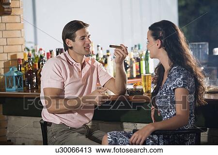Couple in a bar View Large Photo Image Stock Image - Couple in a bar. Fotosearch