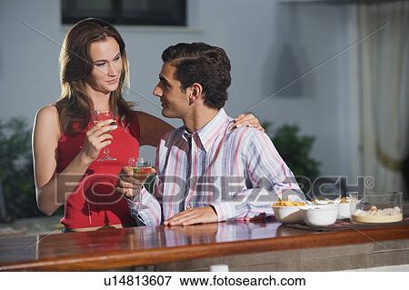 Couple in a bar View Large Photo Image Stock Photo - Couple in a bar. Fotosearch