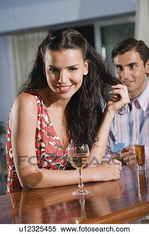 Stock Photography - Couple in a bar. Fotosearch
