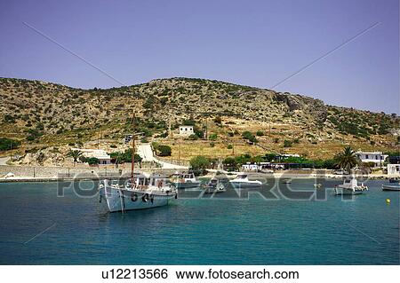 Fishing boats in the sea View Large Photo Image Stock Photograph - Fishing boats in the sea. Fotosearch