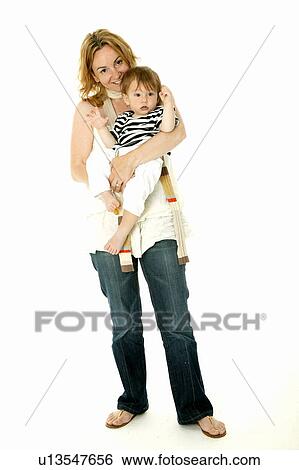 Mother holding child View Large Photo Image Stock Photograph - Mother holding child. Fotosearch