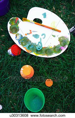 Painter's palette on the grass View Large Photo Image Stock Photo - Painter's palette on the grass. Fotosearch