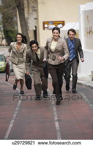 Business people running View Large Photo Image Stock Image - Business people running. Fotosearch