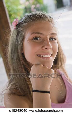 Stock Image - Closeup of female teenager. Fotosearch
