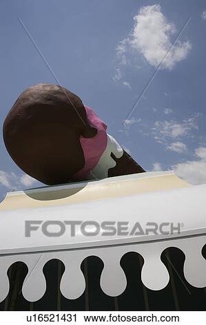 Stock Image - Closeup of giant ice cream cone. Fotosearch