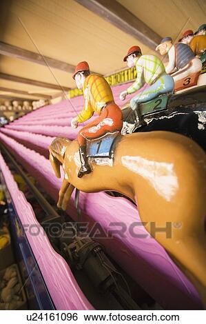 Stock Photograph - Closeup of racing horse game. Fotosearch