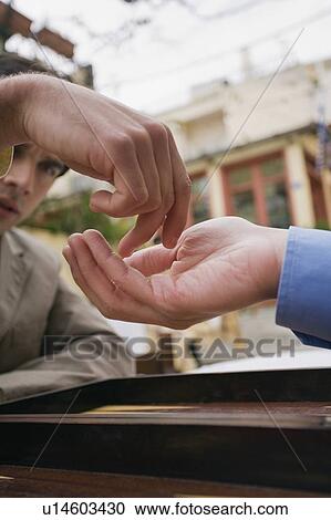 Closeup of two businessmen playing backgammon View Large Photo Image Stock Image - Closeup of two businessmen playing backgammon. Fotosearch
