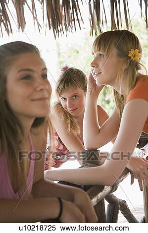 Stock Photography - Female teenagers hanging out. Fotosearch