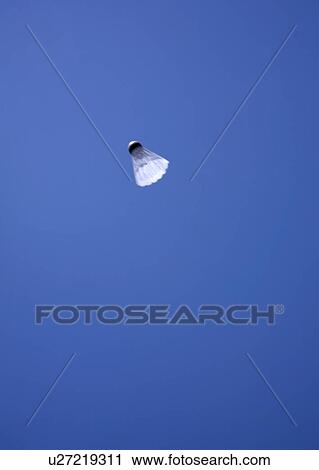 Stock Image - Badminton ball in the sky. Fotosearch