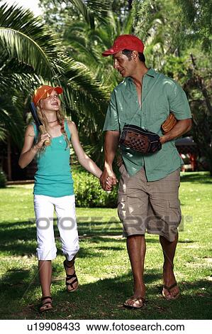 Father and daughter with baseball outfit View Large Photo Image Stock Image - Father and daughter with baseball outfit. Fotosearch