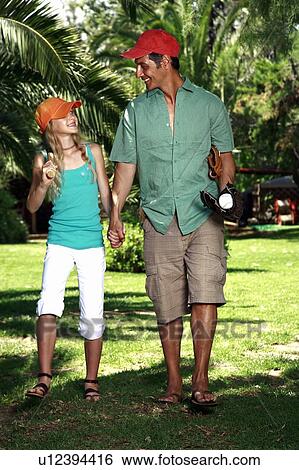 Father and daughter with baseball outfit View Large Photo Image Stock Photograph - Father and daughter with baseball outfit. Fotosearch