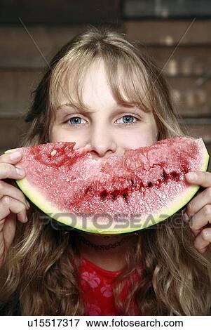Stock Photo - Girl posing with watermelon. Fotosearch
