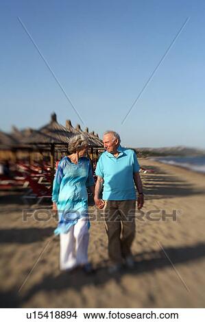 Picture - Senior couple on beach. Fotosearch