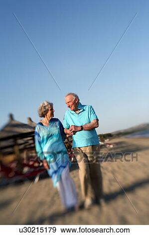 Senior couple on beach View Large Photo Image Stock Photo - Senior couple on beach. Fotosearch
