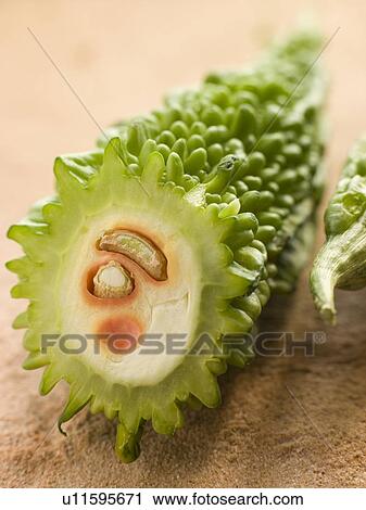 Stock Image - A Karela cut in half. Fotosearch
