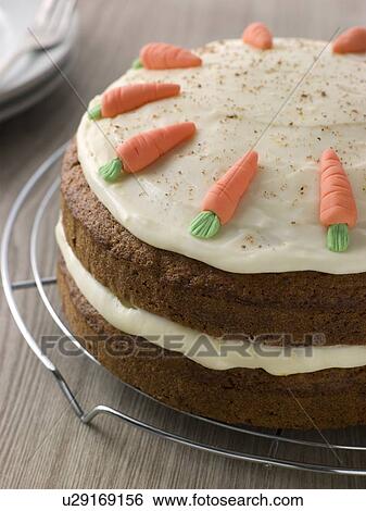 Stock Photograph - American Carrot Cake On A Cooling Rack. Fotosearch