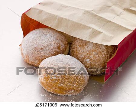 Stock Photograph - Bag Of Raspberry Jam Doughnuts. Fotosearch